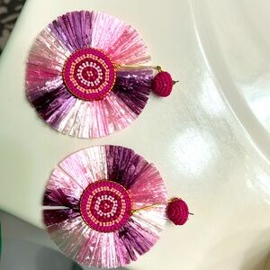 Pink post earrings 3 inch by 3 inch , beaded in center.